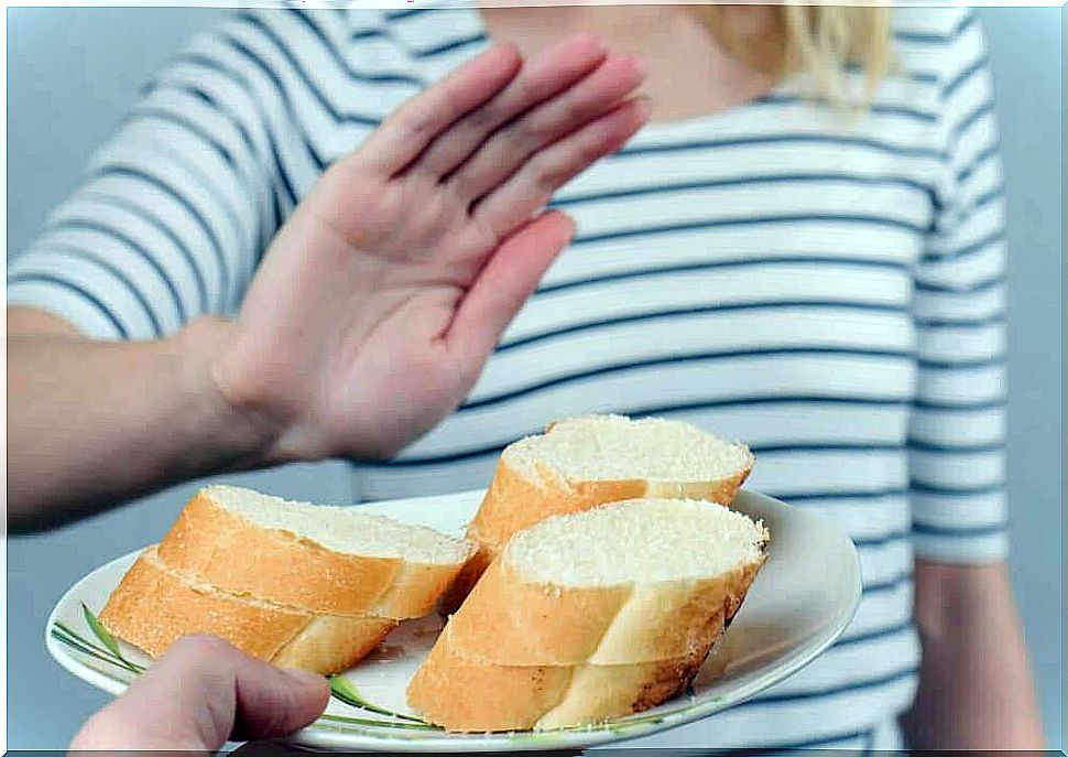 man refusing bread